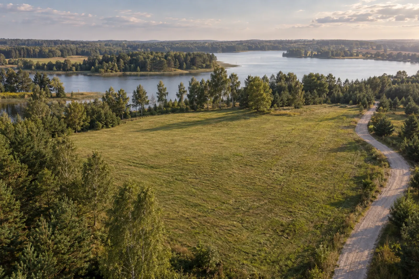 Okolica działki — Kalskie Nowiny, gm. Węgorzewo (zdjęcie poglądowe AI, nie przedstawia konkretnej działki)